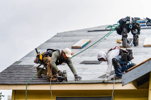 Professional Gutter Installation technician working in Oakland, RI